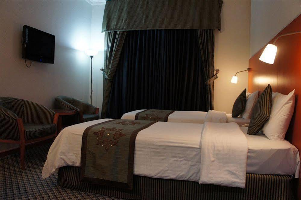 Dream Palace Hotel Дубай Экстерьер фото